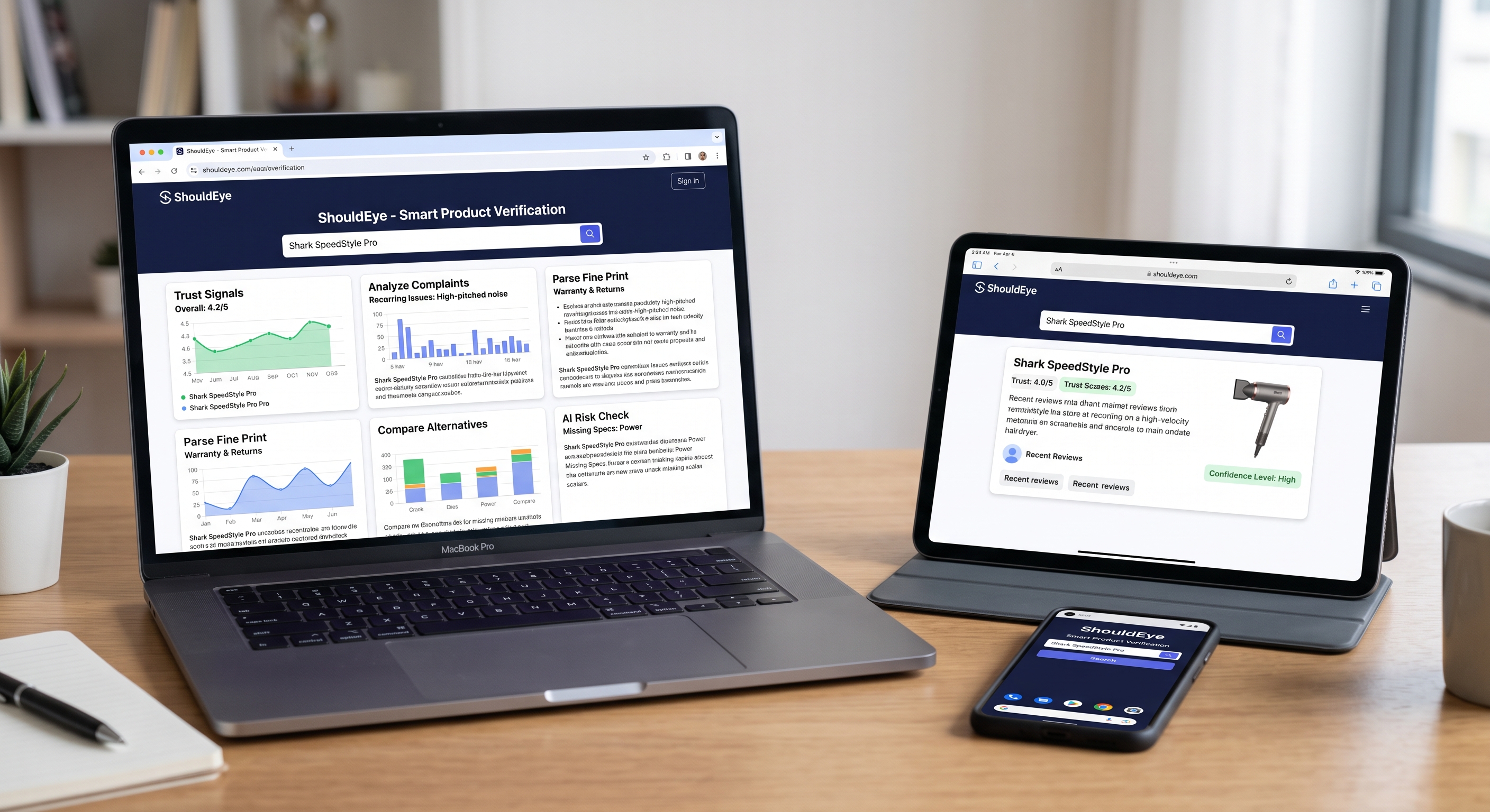 Laptop, tablet, and smartphone displaying the ShouldEye product verification dashboard for the Shark SpeedStyle Pro.